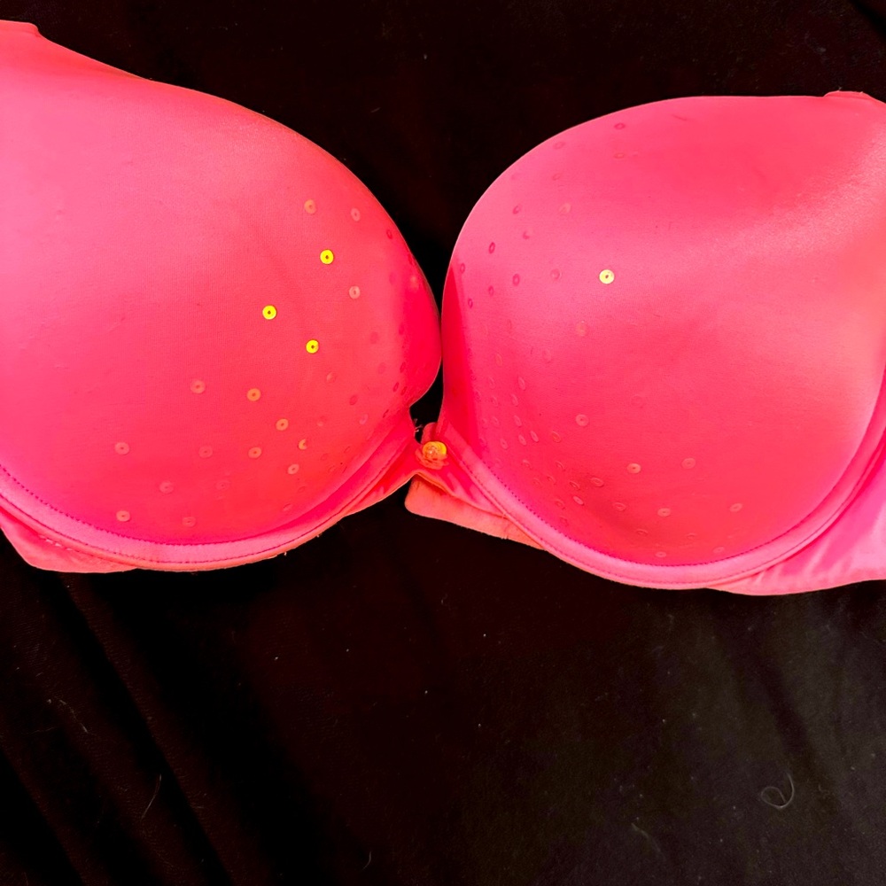 Victorias Secret - never worn - 38D.  Vibrant pink with sequins
